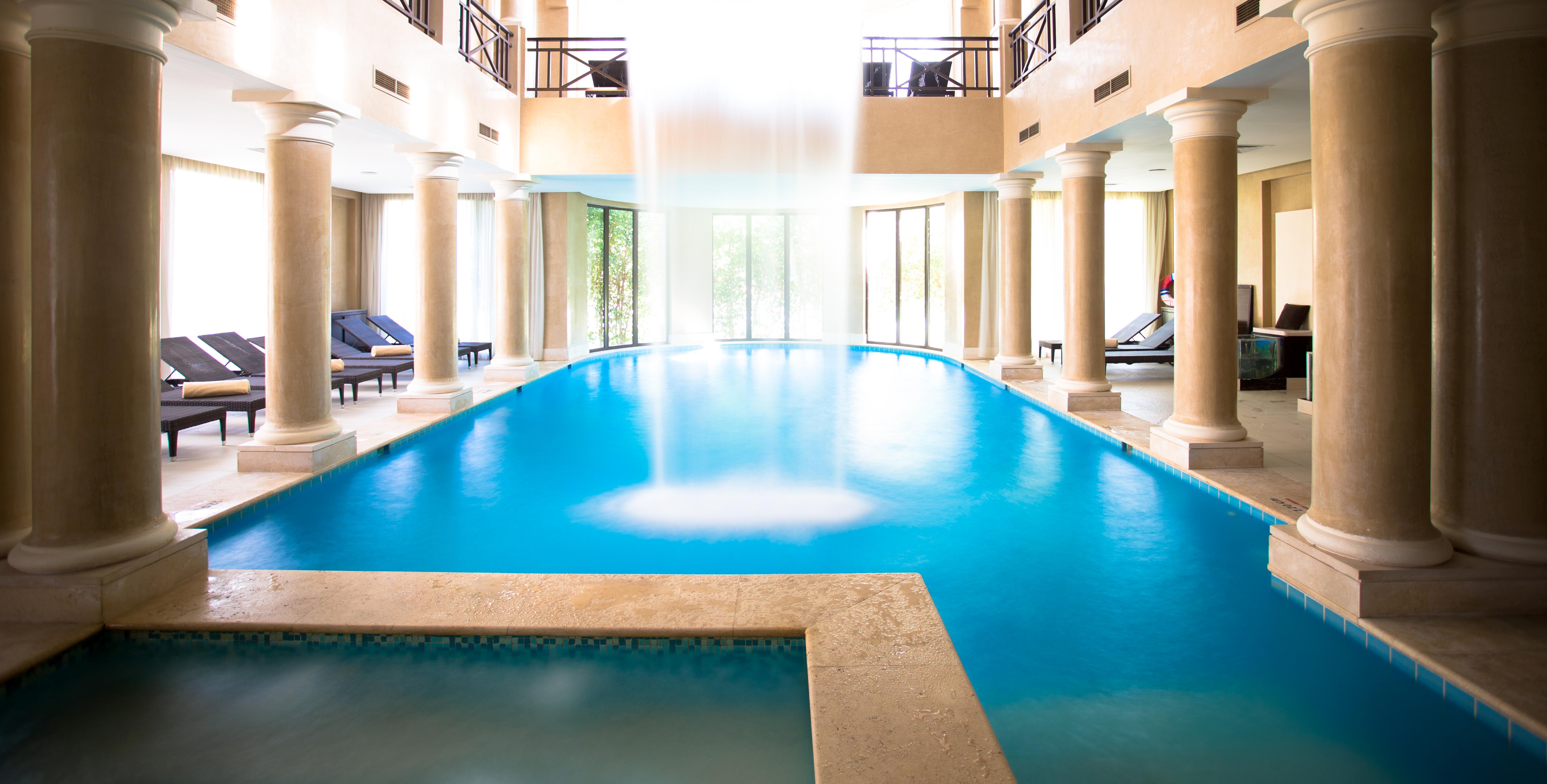 Jaz Aquamarine Resort Hurghada Esterno foto The swimming pool at the hotel